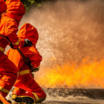 fire flighter training spray water to fire